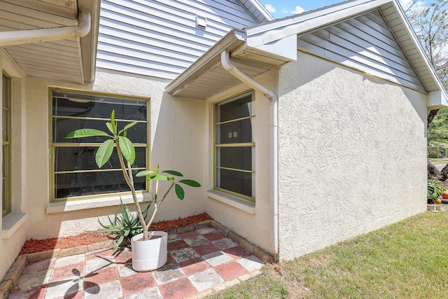 1227 Tuxford Dr, Brandon, FL 33511 - view of home's exterior featuring stucco siding