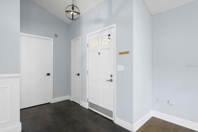 1227 Tuxford Dr, Brandon, FL 33511 - foyer with baseboards and lofted ceiling