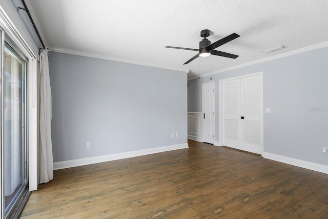 1227 Tuxford Dr, Brandon, FL 33511 - unfurnished bedroom with visible vents, ornamental molding, a textured ceiling, and wood finished floors