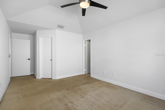 1227 Tuxford Dr, Brandon, FL 33511 - unfurnished bedroom with baseboards, carpet, and lofted ceiling