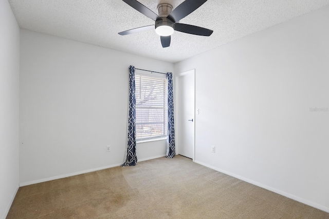 1227 Tuxford Dr, Brandon, FL 33511 - carpeted spare room featuring a ceiling fan, a textured ceiling, and baseboards