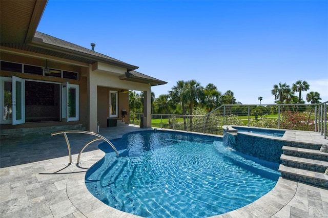 view of swimming pool with ceiling fan, fence, a fenced in pool, a patio area, and an in ground hot tub