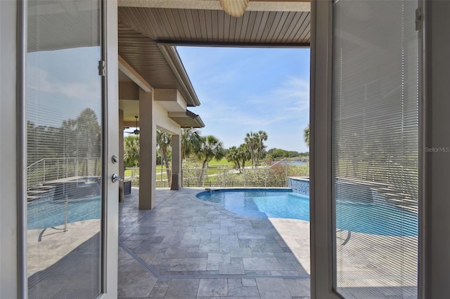 view of swimming pool featuring a fenced in pool and a patio area