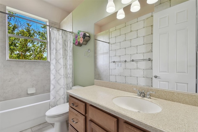 bathroom featuring vanity, shower / bathtub combination with curtain, and toilet