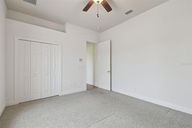 unfurnished bedroom with visible vents, baseboards, and carpet floors