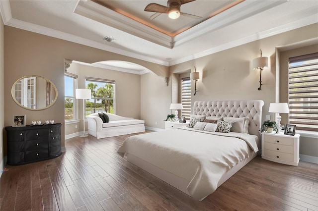 2605 59th St S, Gulfport, FL 33707 - bedroom with ornamental molding, a raised ceiling, wood-type flooring, and baseboards