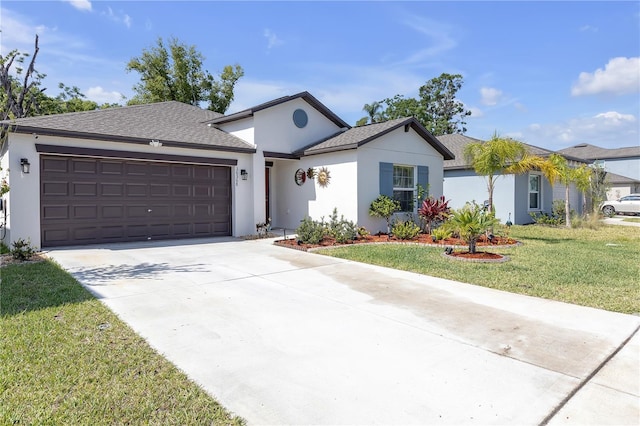 ranch-style home featuring a garage, a front lawn, roof with shingles, stucco siding, and concrete driveway