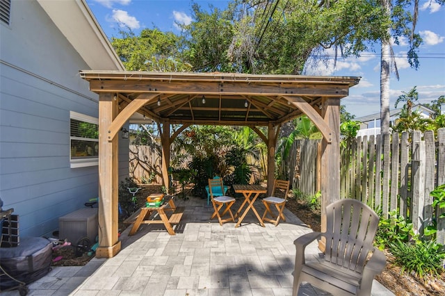13749 80th Ave, Seminole, FL 33776 - view of patio featuring a gazebo and fence