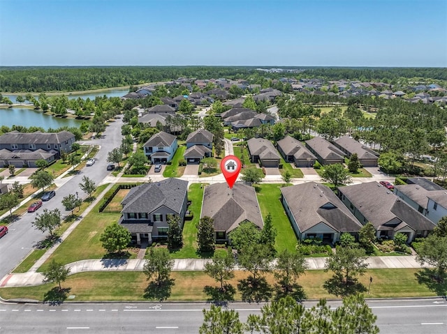 aerial view with a water view and a residential view