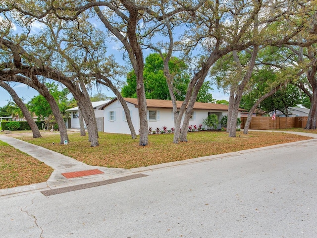1700 25th St N, Saint Petersburg, FL 33713 - single story home featuring fence and a front yard