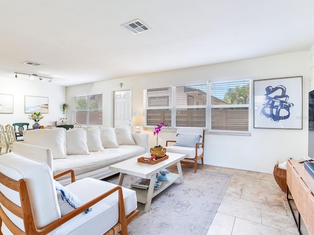 1700 25th St N, Saint Petersburg, FL 33713 - living area featuring visible vents and rail lighting