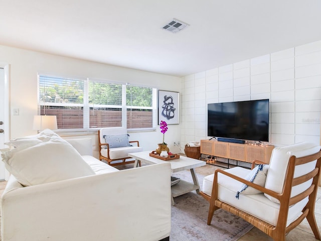 1700 25th St N, Saint Petersburg, FL 33713 - living area featuring tile walls and visible vents