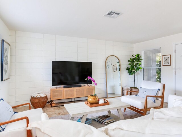 1700 25th St N, Saint Petersburg, FL 33713 - living area featuring tile walls and visible vents