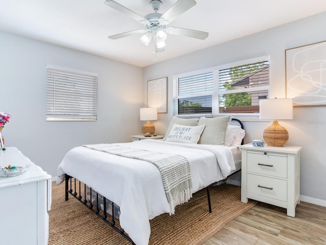 1700 25th St N, Saint Petersburg, FL 33713 - bedroom with baseboards, ceiling fan, and light wood finished floors