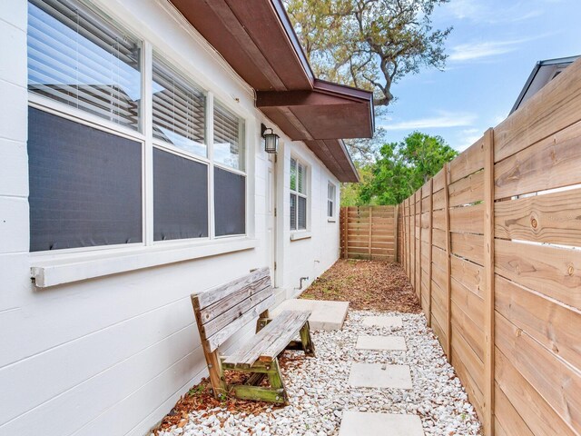 1700 25th St N, Saint Petersburg, FL 33713 - view of side of property with a fenced backyard