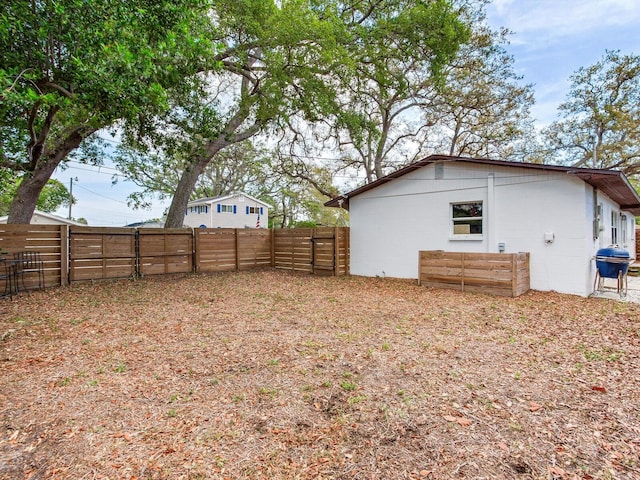 1700 25th St N, Saint Petersburg, FL 33713 - view of yard featuring a fenced backyard