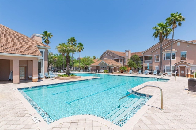 10473 Villa View Cir, Tampa, FL 33647 - community pool featuring a patio and fence