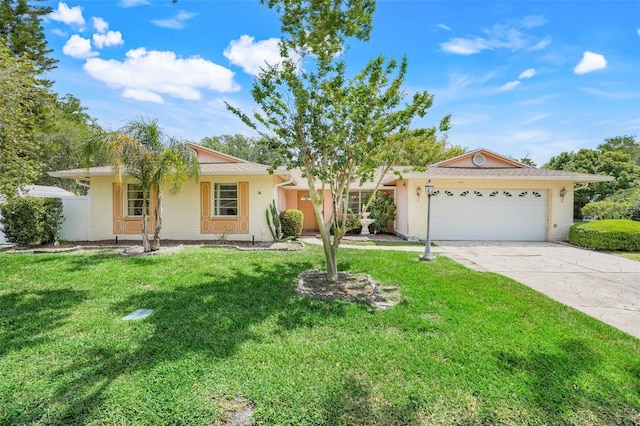 single story home featuring fence, brick siding, a garage, a front yard, and driveway