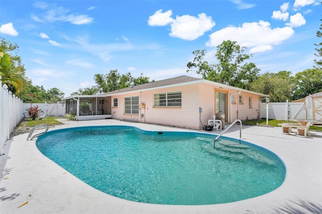 view of pool with a patio, a fenced in pool, a gate, and a fenced backyard