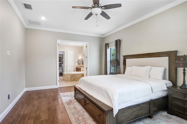 3243 Watermark Dr, Wesley Chapel, FL 33544 - bedroom with wood finished floors, visible vents, baseboards, and ornamental molding