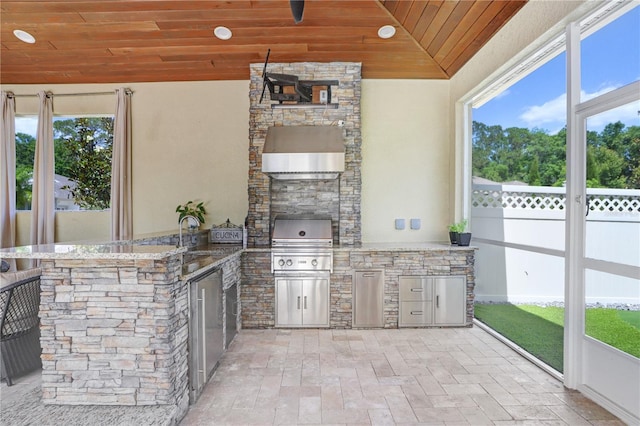 3243 Watermark Dr, Wesley Chapel, FL 33544 - view of patio / terrace featuring a sink, fence, and an outdoor kitchen