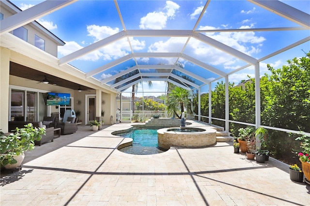 3243 Watermark Dr, Wesley Chapel, FL 33544 - outdoor pool with a patio, an in ground hot tub, outdoor lounge area, ceiling fan, and glass enclosure
