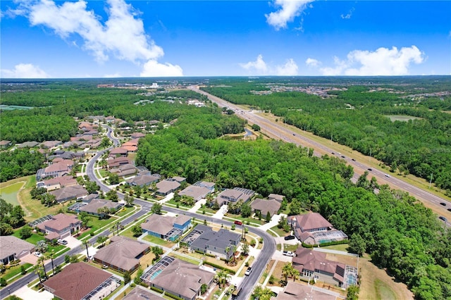 3243 Watermark Dr, Wesley Chapel, FL 33544 - birds eye view of property with a view of trees and a residential view