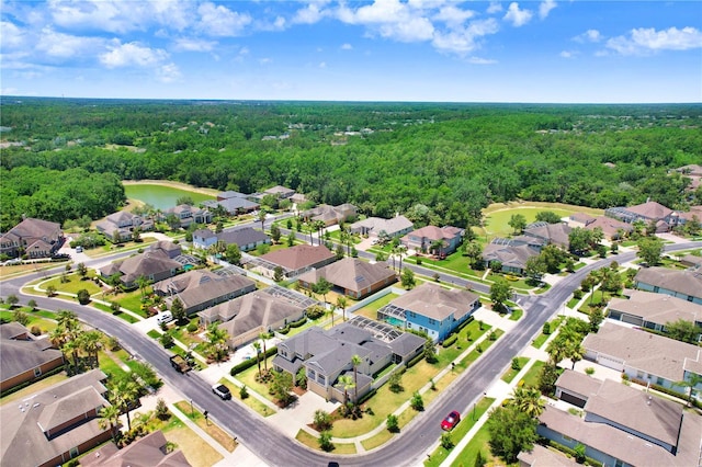 3243 Watermark Dr, Wesley Chapel, FL 33544 - aerial view featuring a water view, a residential view, and a view of trees