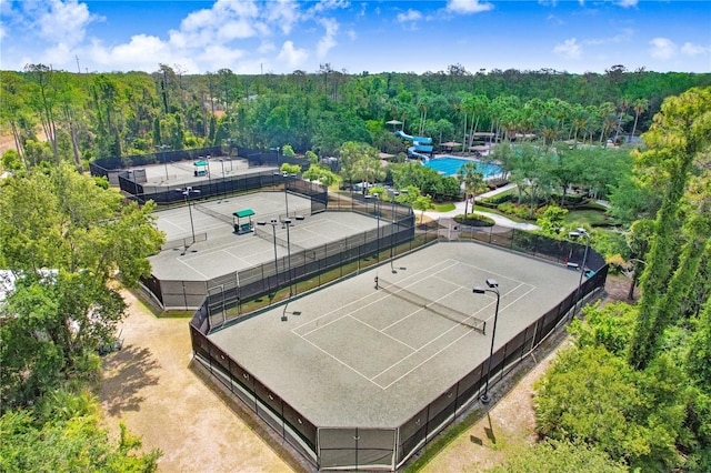 3243 Watermark Dr, Wesley Chapel, FL 33544 - bird's eye view with a wooded view