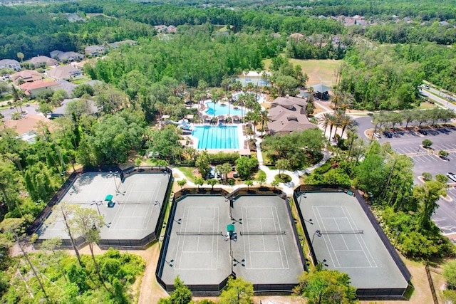 3243 Watermark Dr, Wesley Chapel, FL 33544 - birds eye view of property with a wooded view