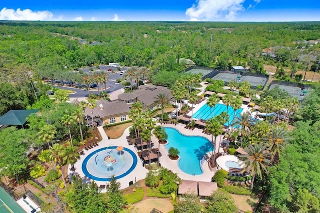 3243 Watermark Dr, Wesley Chapel, FL 33544 - birds eye view of property featuring a view of trees
