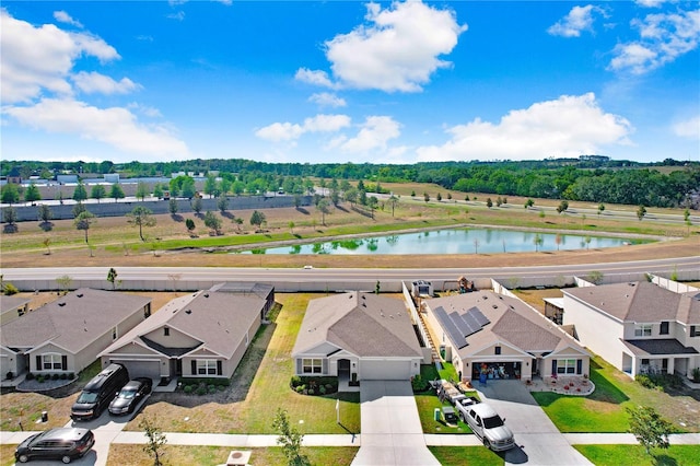 aerial view featuring a water view and a residential view