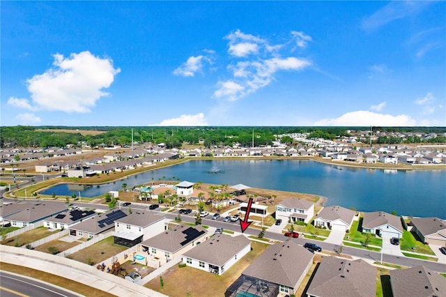 aerial view with a water view and a residential view
