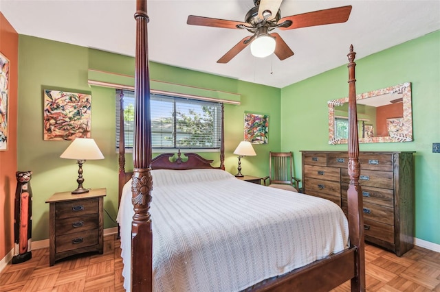 bedroom with ceiling fan and baseboards