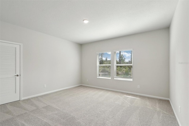 4086 Polynesia Rd, North Port, FL 34288 - spare room with baseboards and light colored carpet