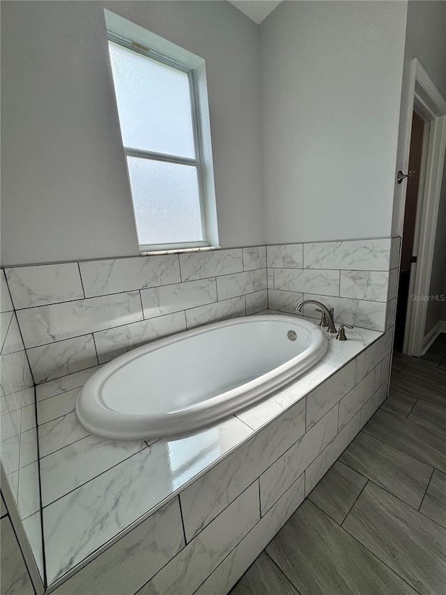 full bath featuring a bath