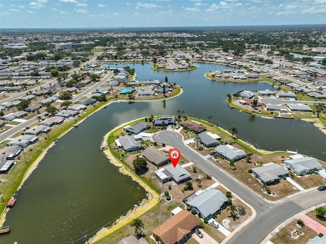 aerial view featuring a water view and a residential view