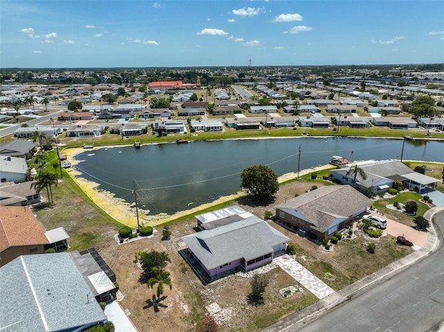 aerial view with a water view and a residential view