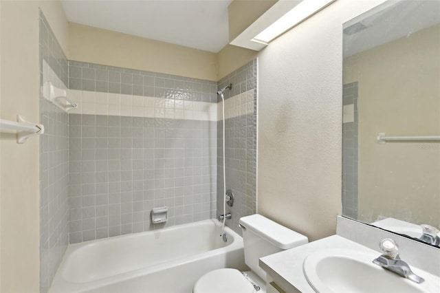 full bathroom featuring toilet, shower / bath combination, and vanity