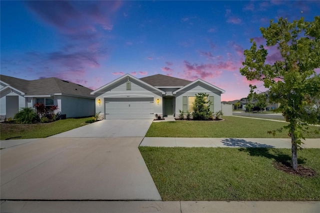 single story home featuring concrete driveway, a front lawn, and an attached garage