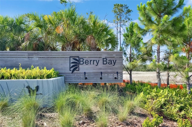 community sign with fence