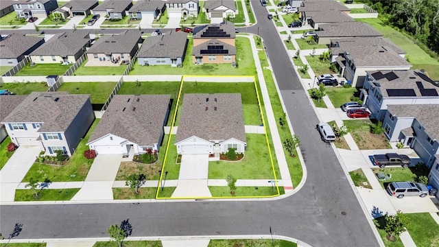 aerial view of residential area with property boundaries highlighted
