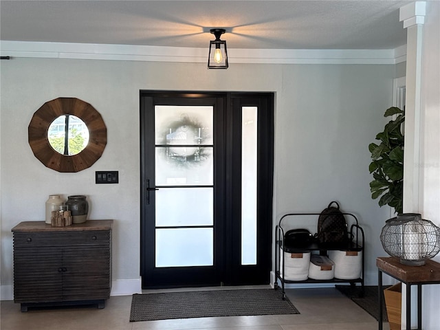 926 Eagle Ln, Apollo Beach, FL 33572 - foyer entrance with baseboards and light tile patterned flooring