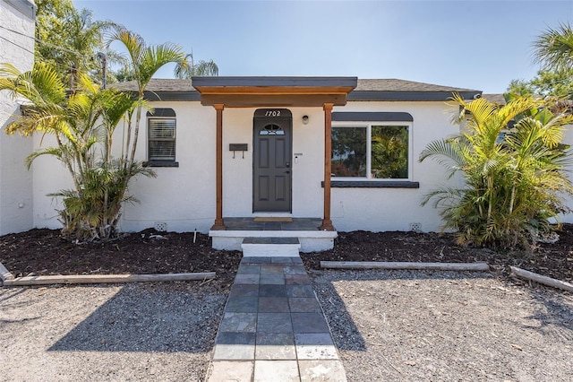 view of front of property featuring stucco siding