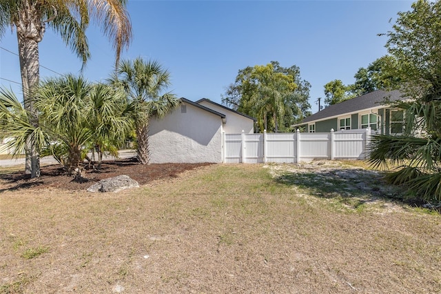view of yard featuring fence