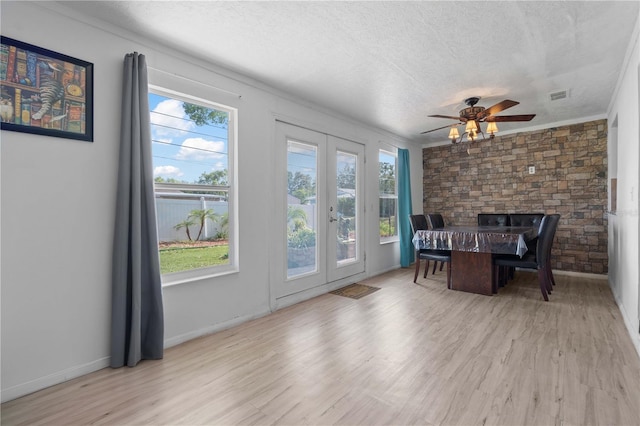 1099 7th Ave NE, Largo, FL 33770 - interior space featuring french doors, visible vents, and a healthy amount of sunlight