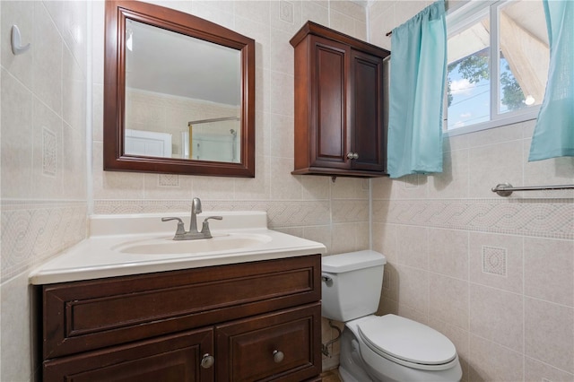 1099 7th Ave NE, Largo, FL 33770 - full bath with walk in shower, tile walls, vanity, and toilet