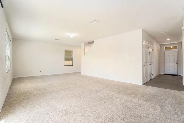 spare room with carpet