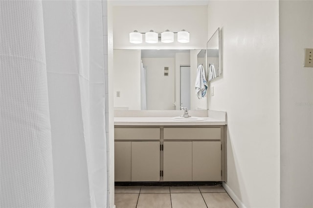 full bath with vanity, tile patterned flooring, and curtained shower