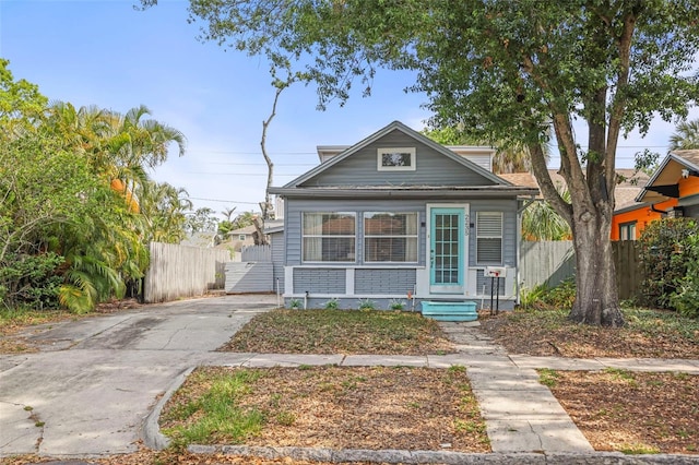 2235 Burlington Ave N, Saint Petersburg, FL 33713 - view of front of house featuring fence and driveway